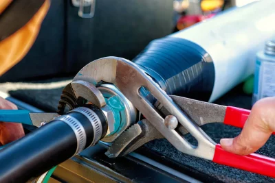 Pipe repair service using professional plumbing tools in Jupiter, Florida